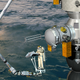 Artist’s depiction of the new arm in action, with an astronaut working on the external control station.